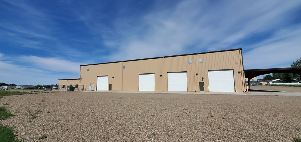 Functional +/-18,000+ SQ FT Shop on 3.11 Acres in Glendive, MT: 123 W Oregon Ln, Glendive, MT 59330